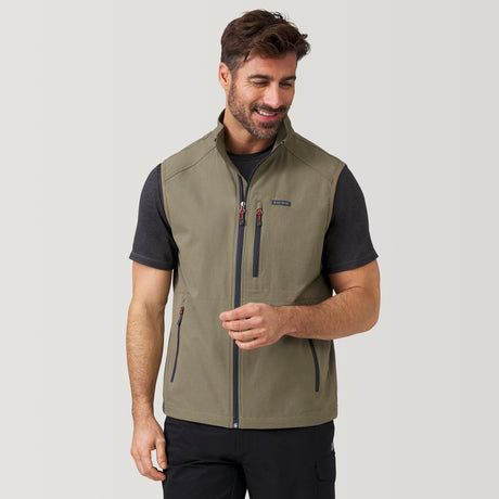 [Justin is 6’1” wearing a size Medium.] Men's Stretch Rip Stop Adventure Vest - M - Putty #color_putty