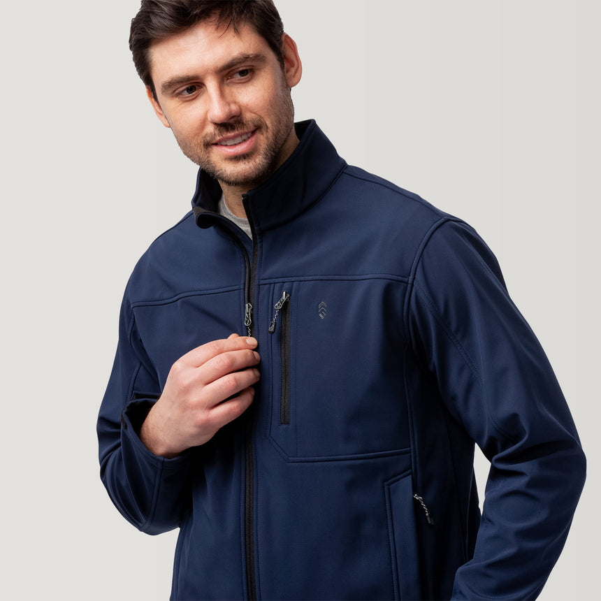 [Model is wearing a size Medium]Men's Artisan Flex Super Softshell® Jacket - Dark Navy #color_dark-navy