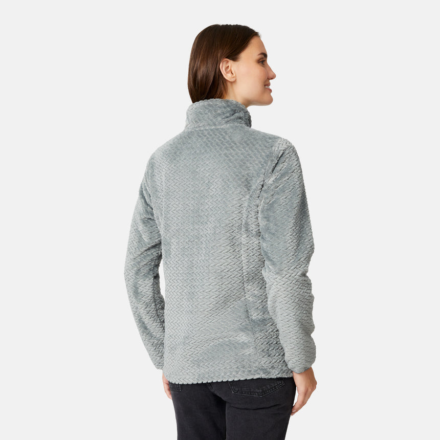 A woman wears a grey Women’s Cable Braided Butter Pile® Jacket with a high collar, shown from the back.