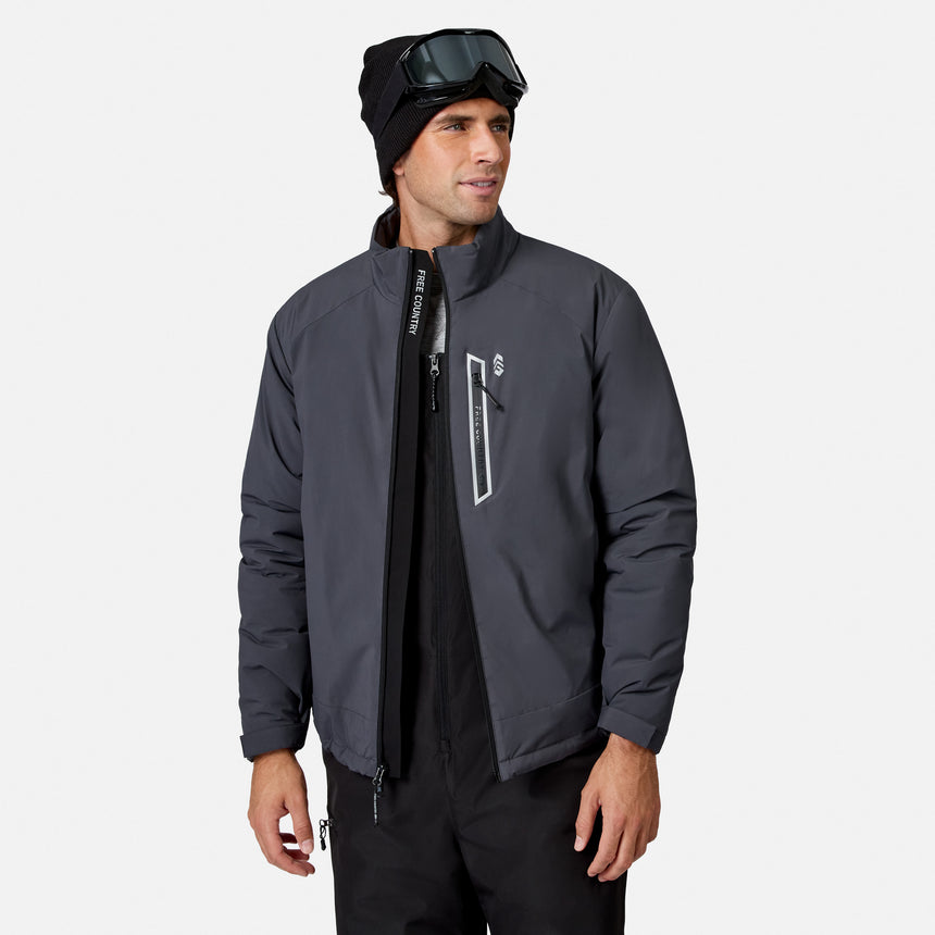 Male model in a dark gray Ace Puffer Jacket with high collar and ski goggles atop a black knit beanie.