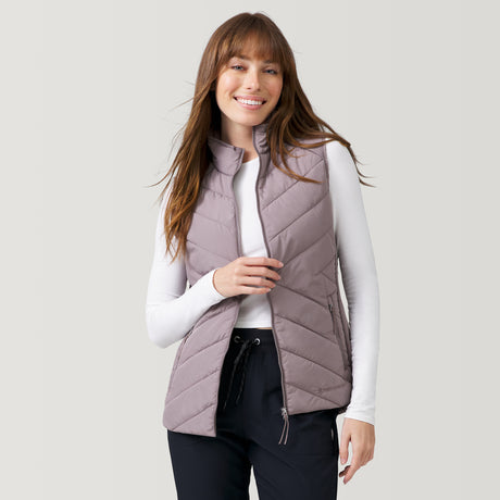 [Melanie is 5’8.5” wearing a size Small.] Women's Quilted Hybrid Vest - S - Taupe #color_taupe
