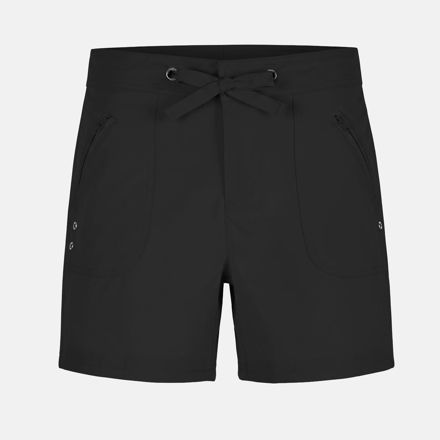 The Free Country Women's 5" Bermuda Board Short features a drawstring waistband, four-way stretch fabric, zippered side pockets, decorative buttons, and a small reflective logo on the front left leg. Shown on a plain light background.