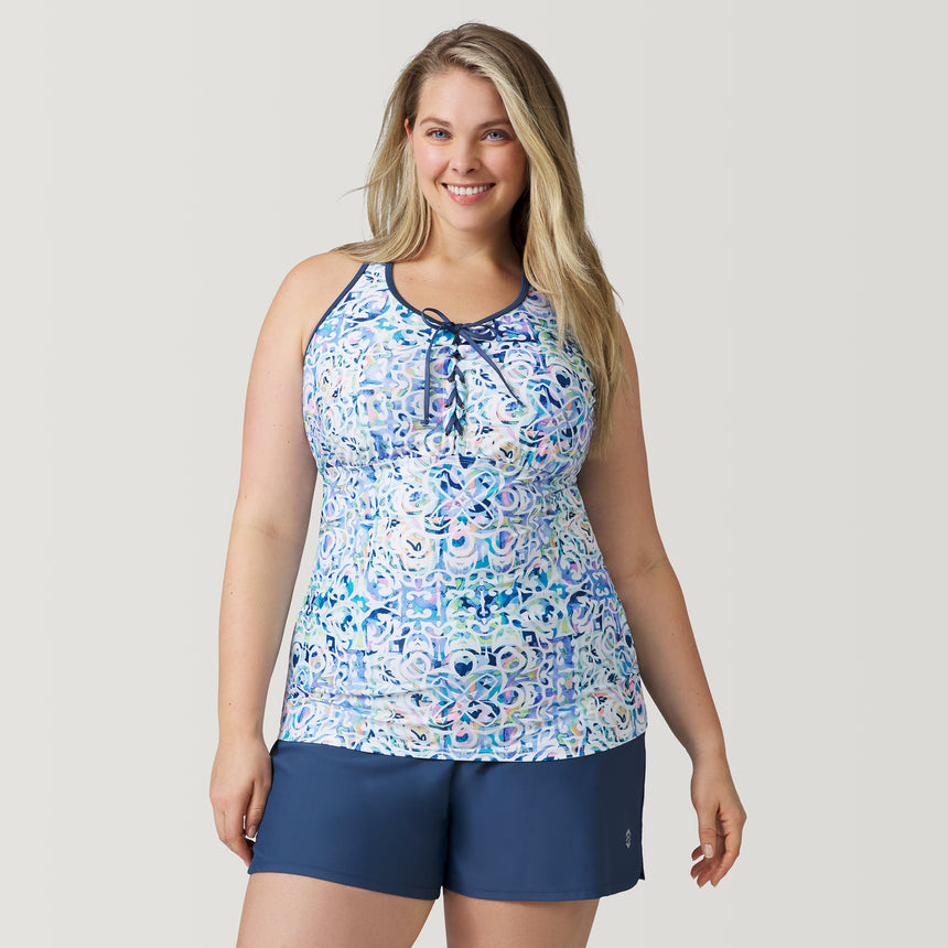 [Angela is 5'10" and wearing a size 1X.] Women's Plus Size Mosaic Mirage Lace Up Racerback Tankini Top - 1X #color_periwinkle-mosaic-mirage