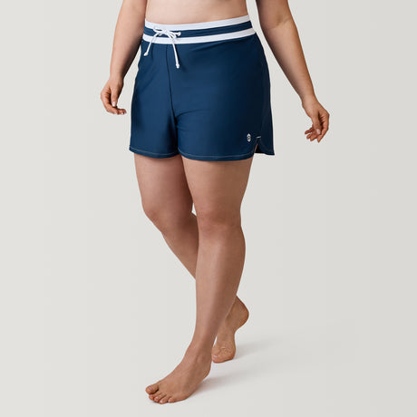 [Model is 5’10” wearing a size 1X] Women's Plus Size Drawstring Swim Short - Navy-White #color_navy-white