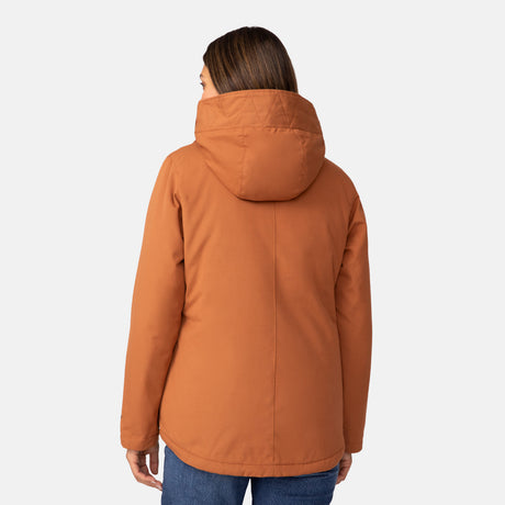 A woman with long brown hair is seen from behind, modeling the Clearance Women's Cascade Canvas 3-in-1 Systems Jacket in orange and blue jeans against a plain white background.