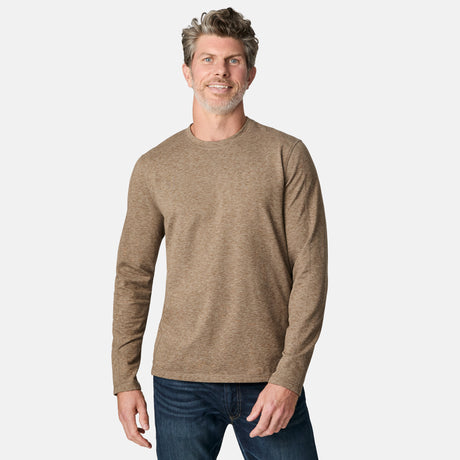 [Kolby is 6'2" wearing size M.] Man wearing a brown long-sleeve shirt on a white background