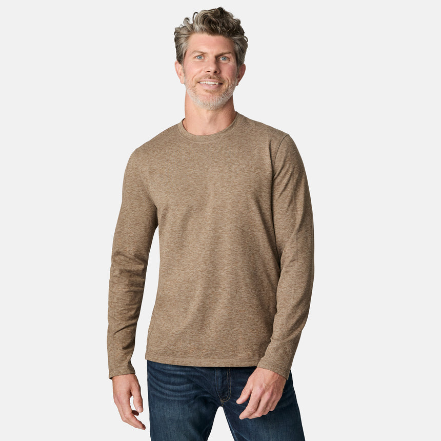 [Kolby is 6'2" wearing size M.] Man wearing a brown long-sleeve shirt on a white background
