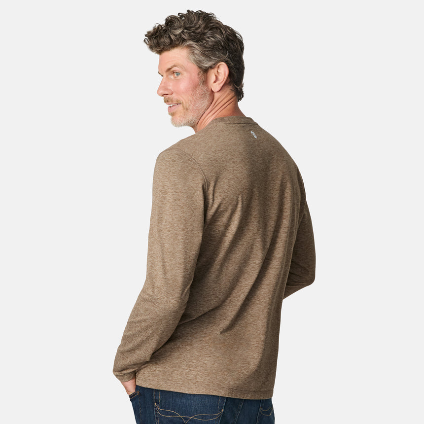 [Kolby is 6'2" wearing size M.] Man wearing a brown long-sleeve shirt on a white background
