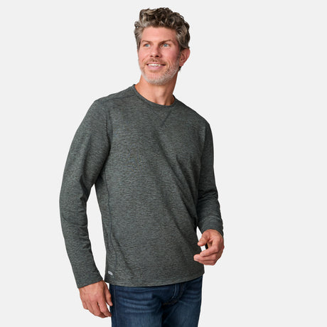 [Kolby is 6'2" wearing size M.] Man wearing a green long-sleeve shirt on a white background