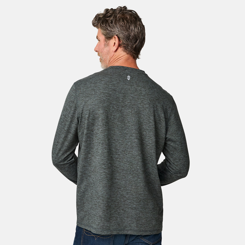 [Kolby is 6'2" wearing size M.] Man wearing a green long-sleeve shirt on a white background