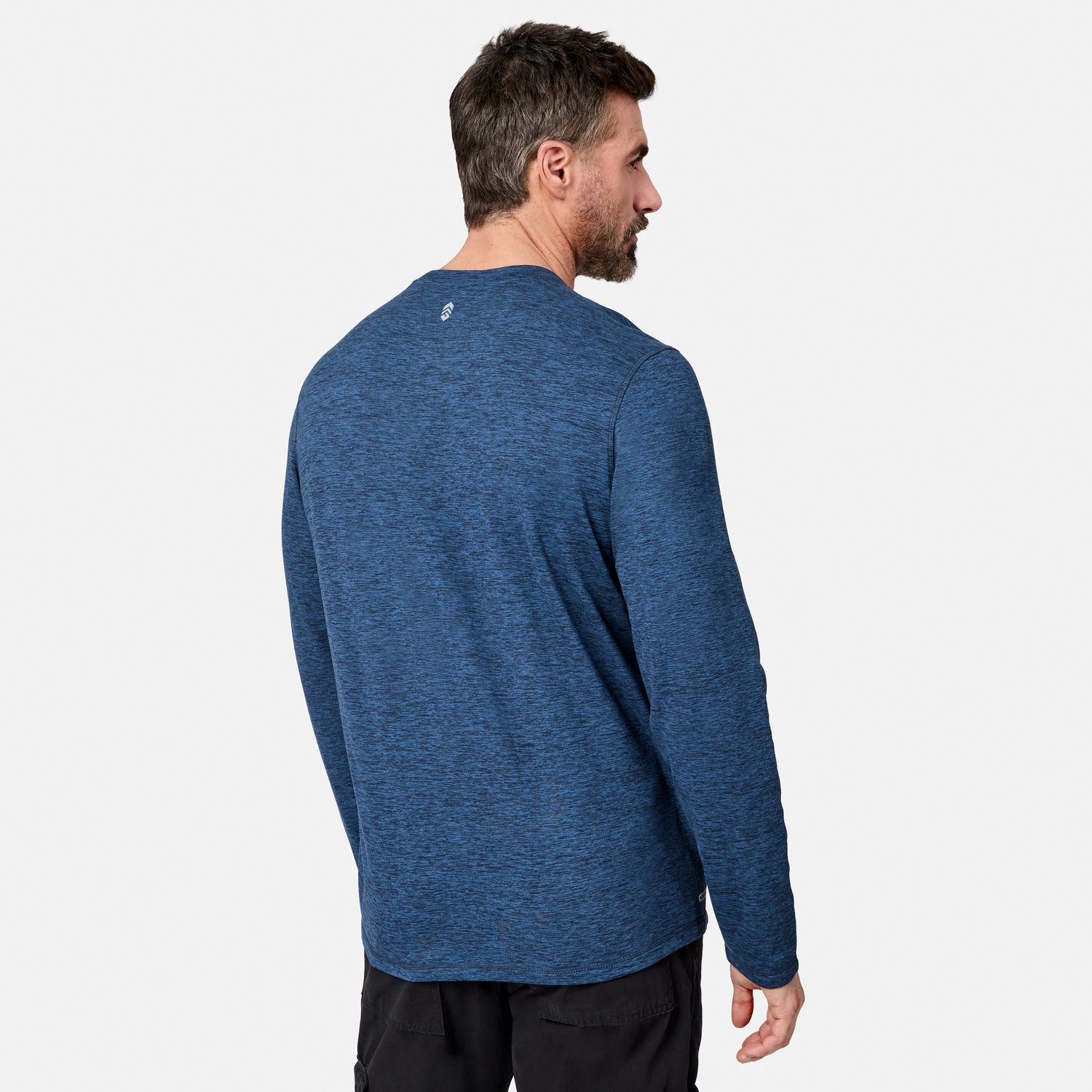[Model is wearing size M.] A man wearing a heathered blue long-sleeve shirt, shown from the back and side against a light gray studio background.