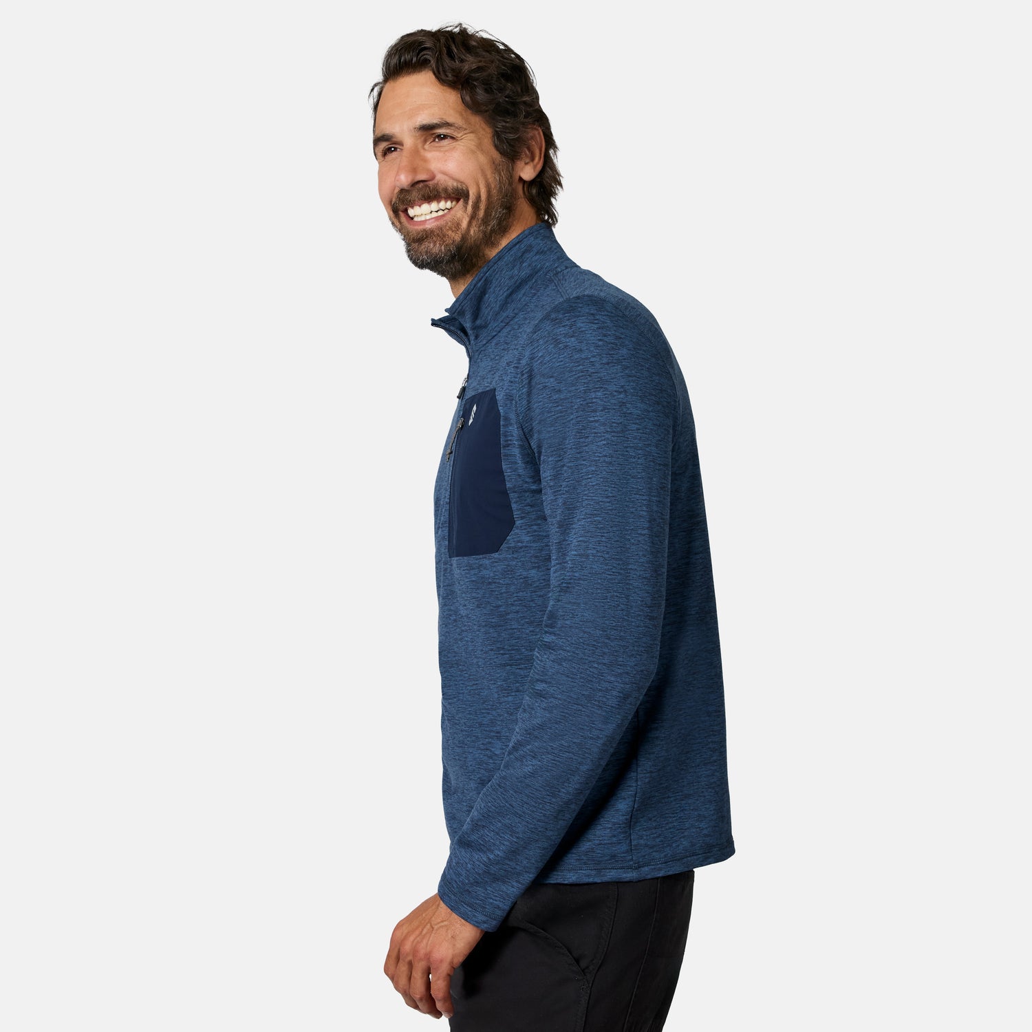 [Model is wearing size M.] A man wearing a heathered blue long-sleeve quarter-zip pullover with a solid dark blue chest pocket, shown in profile against a light gray studio background.