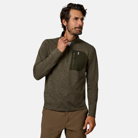 [Model is wearing size M.] A man wearing a dark olive green long-sleeve quarter-zip pullover with a chest pocket, paired with brown pants, against a light gray background.
