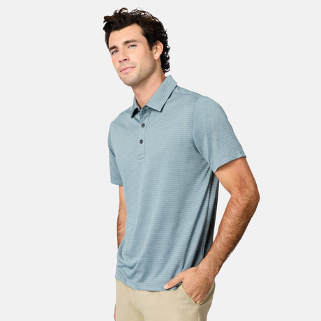[Jacob is 6’1.5" wearing size M] Man wearing a light blue striped polo shirt on a white background