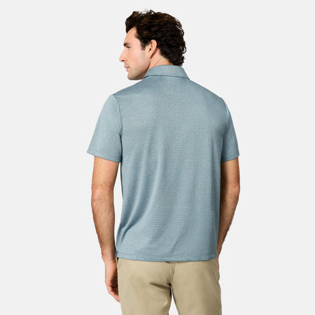 [Jacob is 6’1.5" wearing size M] Back view of man wearing a light blue striped polo shirt on a white background