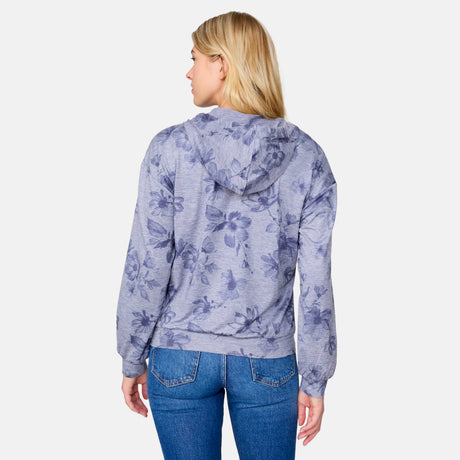 A woman with blonde hair wears the Clearance Women's Cloud Knit Zip Hoodie and blue jeans, standing with her back to the camera against a plain white background.