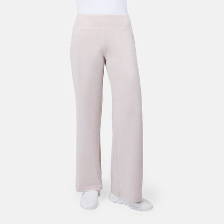 [Model is wearing size S] Light tan wide-leg pants worn by a person on a white background