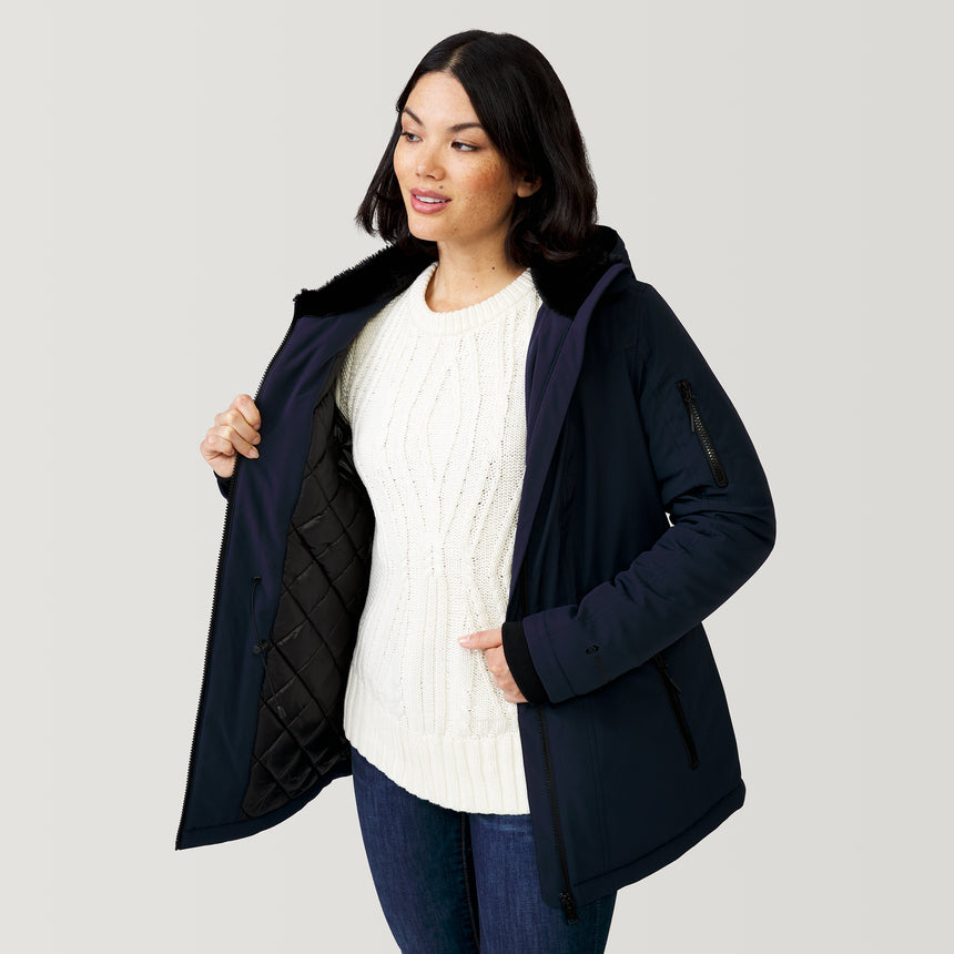 [Megan is 5’6” wearing a size Small.] Women's Thermo Super Softshell® Long Jacket - Urban Navy - S #color_urban-navy
