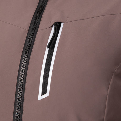 Woman wearing Free Country Women's FreeCycle® Thermo Super Softshell® II Jacket in light brown with a full front zipper opening, lower pockets, soft lining, a detachable hood with an adjustable drawcord, and water resistant and wind resistant stretch performance fabric, light grey background. Best women’s jacket for winter weather.