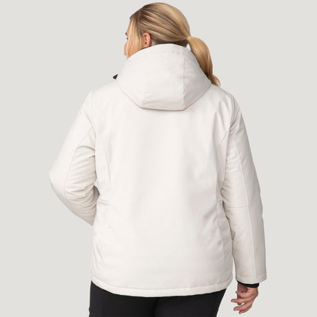 [Lola is 5'10.5" wearing a size 1X.] Woman wearing Free Country Women's Plus Size FreeCycle® Thermo Super Softshell® II Jacket in white with a full front zipper opening, lower pockets, soft lining, a detachable hood with an adjustable drawcord, and water resistant and wind resistant stretch performance fabric, light grey background. Best women’s jacket for winter weather.
