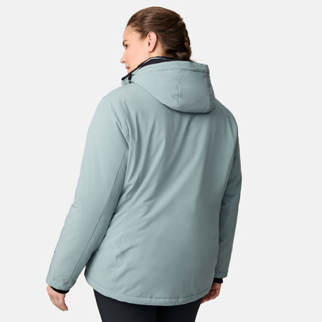 A woman with a braid is shown from behind wearing the Free Country Women's Plus Size FreeCycle® Thermo Super Softshell® II Jacket in light blue and black pants against a plain white background.