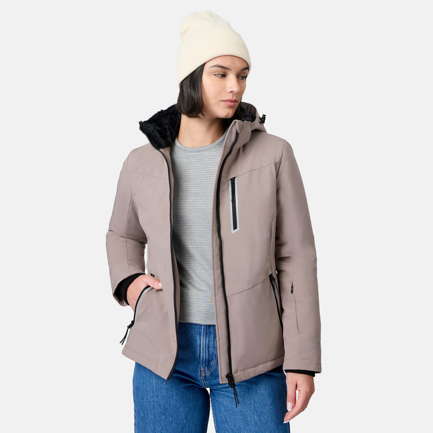 Side view of a woman wearing a cream beanie and taupe Women's FreeCycle Thermo Softshell II jacket