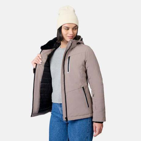 Woman wearing a cream beanie with a taupe Women's FreeCycle Thermo Softshell II jacket partially unzipped to reveal black lining