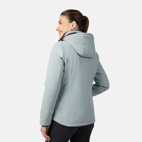A woman with brown hair in a ponytail smiles as she models the Free Country Women's FreeCycle® Thermo Super Softshell® II Jacket in light gray, showing its water-resistant back against a plain white background.
