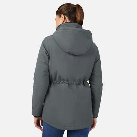 A woman with brown hair in a ponytail models the Free Country Women's Thermo Super Softshell® Long Jacket with blue jeans, shown from the back against a plain white background.