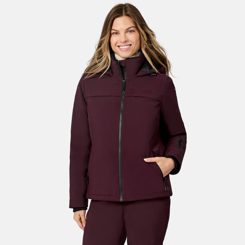 [Model is wearing size S.] Smiling woman wearing burgundy Women's Thermo Super Softshell lined jacket with beige fleece collar.