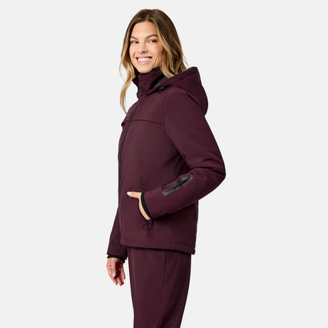 [Model is wearing size S.] Model wearing burgundy Thermo Super Softshell Lined Jacket with hood and front zipper