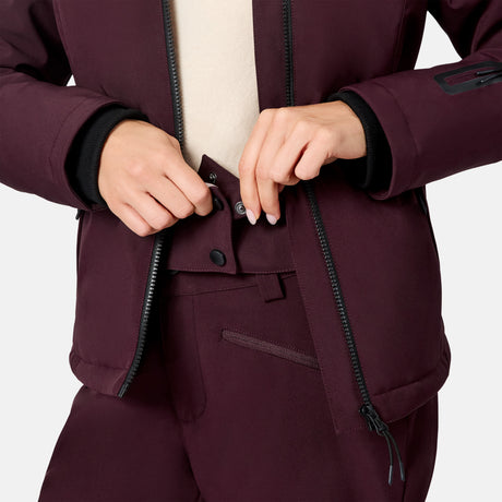 [Model is wearing size S.] Close up of burgundy Women's Thermo Super Softshell jacket showing front zipper snap closure and cuff detail.