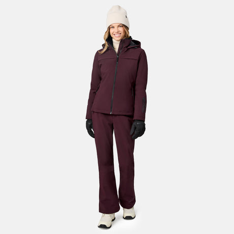 [Model is wearing size S.] Woman modeling a burgundy Women's Thermo Super Softshell lined jacket with front zipper and hood.