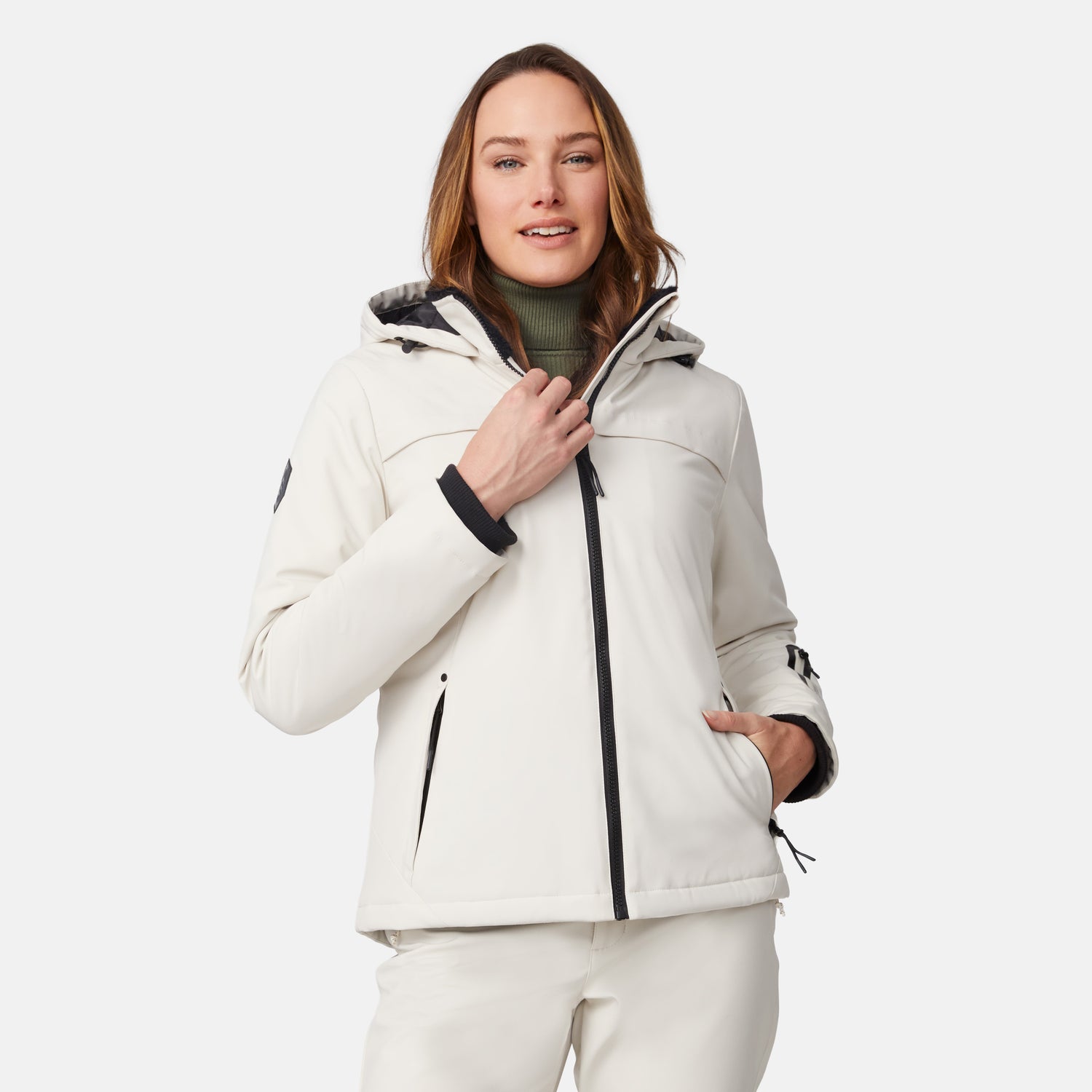 [Model is wearing size S.] Woman wearing a white Women's Thermo Super Softshell lined jacket with hood and green turtleneck.