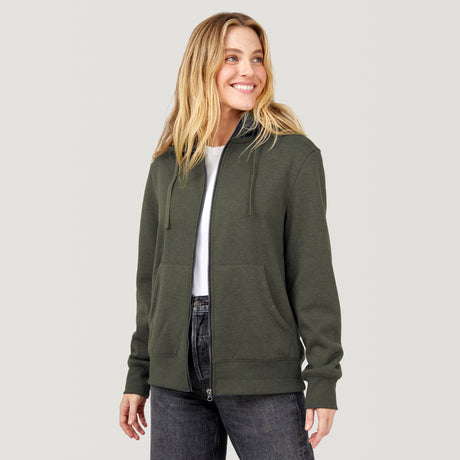 [Brooke is 5'9” wearing a size Small.] Free Country Everybody Hoodies in dark green, featuring soft melange fabric, moisture-wicking properties, and black drawstrings, styled with casual T-shirts and dark pants.