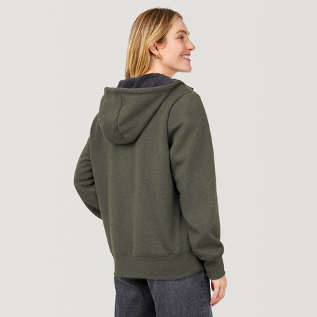 [Brooke is 5'9” wearing a size Small.] Free Country Everybody Hoodies in dark green, featuring soft melange fabric, moisture-wicking properties, and black drawstrings, styled with casual T-shirts and dark pants.