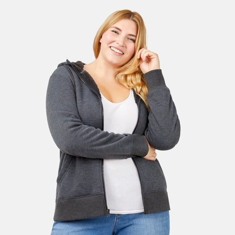 [Lola is 5’10.5” wearing a size Extra Extra Large.] Free Country Everybody Hoodies in dark grey, featuring soft melange fabric, moisture-wicking properties, and black drawstrings, styled with casual T-shirts and dark pants.