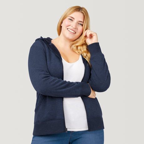 [Lola is 5’10.5” wearing a size Extra Extra Large.] Free Country Everybody Hoodies in navy, featuring soft melange fabric, moisture-wicking properties, and black drawstrings, styled with casual T-shirts and dark pants.