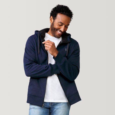 [Jonathan is 6'1” wearing a size Medium.] Free Country Everybody Hoodies in navy, featuring soft melange fabric, moisture-wicking properties, and black drawstrings, styled with casual T-shirts and dark pants.