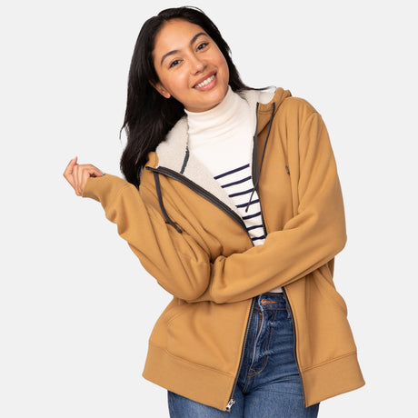 [Model is wearing a size Small.] The Free Country Everybody Hoodies in yellow, featuring soft melange fabric, moisture-wicking properties, and black drawstrings, styled with casual T-shirts and dark pants.