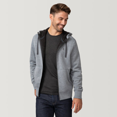 [Matt is 6'2" wearing a size Medium.] Free Country Everybody Hoodies in gray, featuring soft melange fabric, moisture-wicking properties, and black drawstrings, styled with casual T-shirts and dark pants.