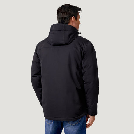 Back view of a person wearing a black Men’s Wild Land Mid Weight Jacket and blue jeans.