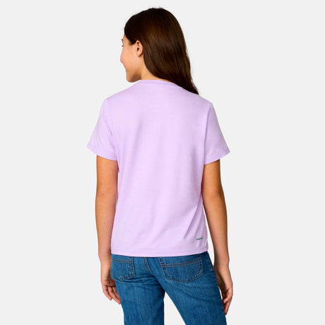 [Model is wearing a size Medium.] Girl wearing the Free Country Girls’ Microtech® Graphic Crew Neck Shirt in Lavender, size M, featuring lightweight odor free fabric and upf protection, paired with blue jeans #color_ lavender
