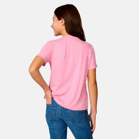 [Model is wearing a size Medium.] Girl  wearing the Free Country Girls’ Microtech® Crew Neck Shirt in Pink, size M, featuring lightweight odor free fabric and upf protection, paired with blue jeans #color_ pink