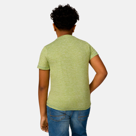 [Model is wearing a size Medium.] Boy wearing the Free Country Boys' Microtech® Crew Neck Shirt in Pistachio, size M, featuring lightweight odor free fabric and upf protection, paired with blue jeans #color_ pistachio