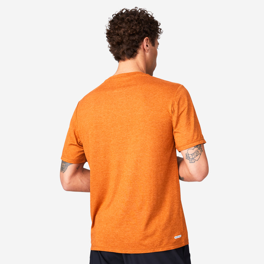 A man seen from behind wearing an orange Men’s Super Soft Microtech® Short Sleeve Crew Tee.