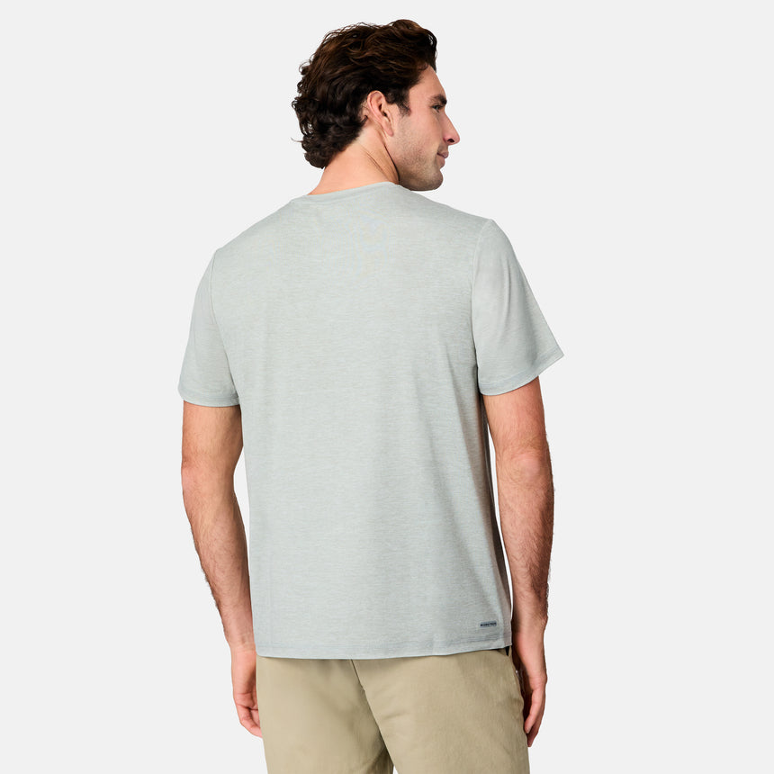 [Jacob is 6’1.5" wearing size M] Back view of man wearing a light gray t-shirt on a white background