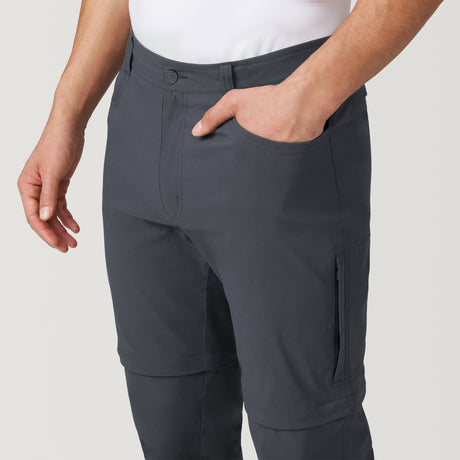 [Model is wearing a size Medium.] Men's Nylon Stretch Convertible Pant - Deep Charcoal #color_deep-charcoal