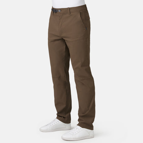 Brown pants worn by a person on a white background