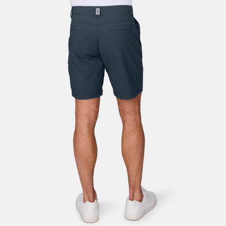 Free Country Men's Nylon Stretch Trek Short in Steel, size M, made from lightweight stretch performance fabric featuring a water repellent finish, an adjustable waist belt, two back welt pockets, and two side sipper pockets #color_steel